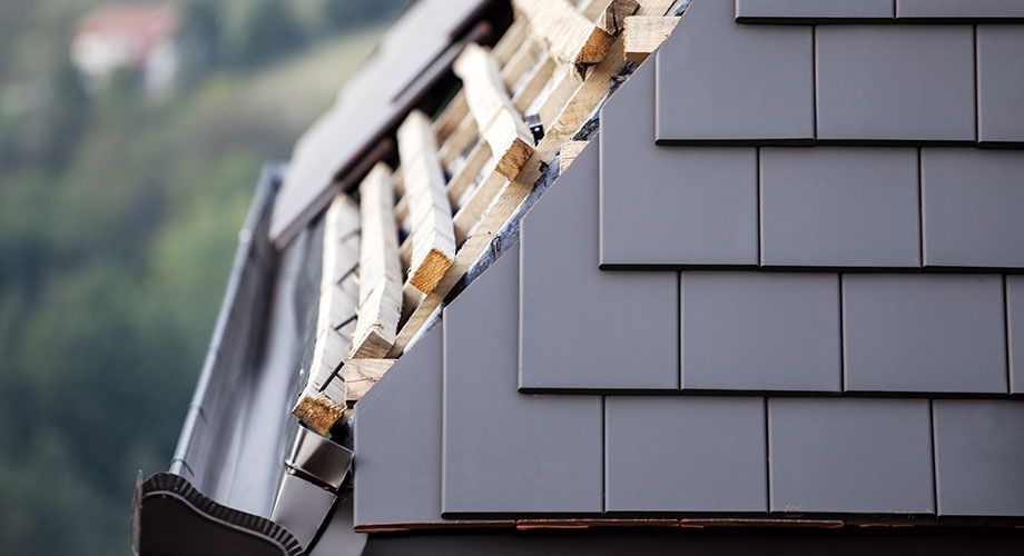 A slate roof being installed